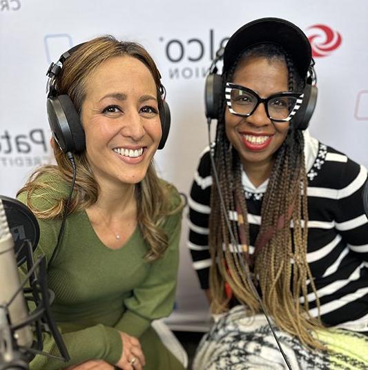 Patelco employees Michele Enriquez and Veronica Dangerfield at the podcast desk